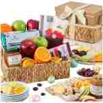 Easter Fruit Basket of Fresh Fruits, Cheese, Caramel Sauce and Chocolate by GourmetGiftBaskets.com