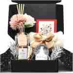 Gifts for Women,Mothers Day Gifts for Mom,Includes Scented Candle Reed Diffuser Fuzzy Socks Snow Globe Decor Flowers Gift Wrap Boxes
